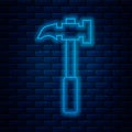 Glowing neon line Claw hammer icon isolated on brick wall background. Carpenter hammer. Tool for repair. Vector
