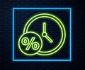 Glowing neon line Clock and percent icon isolated on brick wall background. Vector Illustration Royalty Free Stock Photo