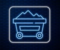 Glowing neon line Coal mine trolley icon isolated on brick wall background. Factory coal mine trolley. Vector