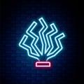 Glowing neon line Coral icon isolated on brick wall background. Colorful outline concept. Vector