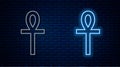 Glowing neon line Cross ankh icon isolated on brick wall background. Vector