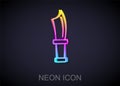 Glowing neon line Diving knife icon isolated on black background. Vector