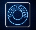 Glowing neon line Donut with sweet glaze icon isolated on brick wall background. Vector Illustration