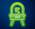 Glowing neon line Dressing table icon isolated on blue background. Vector Royalty Free Stock Photo