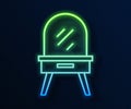 Glowing neon line Dressing table icon isolated on blue background. Vector Royalty Free Stock Photo