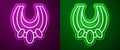 Glowing neon line Egyptian necklace icon isolated on purple and green background. Vector