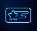 Glowing neon line Falling star icon isolated on brick wall background. Shooting star with star trail. Meteoroid Royalty Free Stock Photo