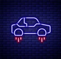 Glowing neon line Fantastic flying car icon isolated on brick wall background. Hover car future technology future
