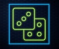 Glowing neon line Game dice icon isolated on brick wall background. Casino gambling. Vector Royalty Free Stock Photo