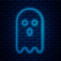 Glowing neon line Ghost icon isolated on brick wall background. Vector