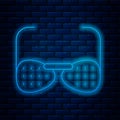 Glowing neon line Glasses for the blind and visually impaired icon isolated on brick wall background. Vector