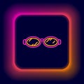Glowing neon line Glasses for swimming icon isolated on black background. Goggles sign. Diving underwater equipment Royalty Free Stock Photo