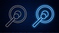 Glowing neon line Gong musical percussion instrument circular metal disc and hammer icon isolated on brick wall