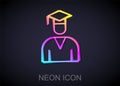 Glowing neon line Graduate and graduation cap icon isolated on black background. Vector