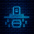 Glowing neon line Grave with tombstone and coffin icon isolated on brick wall background. Vector