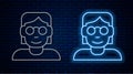 Glowing neon line Hacker or coder icon isolated on brick wall background. Programmer developer working on code, coding