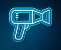 Glowing neon line Hair dryer icon isolated on blue background. Hairdryer sign. Hair drying symbol. Blowing hot air