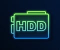 Glowing neon line Hard disk drive HDD icon isolated on blue background. Vector Royalty Free Stock Photo
