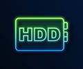 Glowing neon line Hard disk drive HDD icon isolated on blue background. Vector Royalty Free Stock Photo