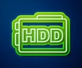 Glowing neon line Hard disk drive HDD icon isolated on blue background. Vector Royalty Free Stock Photo