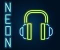 Glowing neon line Headphones icon isolated on black background. Support customer service, hotline, call center, faq Royalty Free Stock Photo