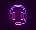 Glowing neon line Headphones with microphone icon isolated on black background. Colorful outline concept. Vector Royalty Free Stock Photo