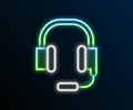 Glowing neon line Headphones with microphone icon isolated on black background. Colorful outline concept. Vector Royalty Free Stock Photo