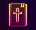 Glowing neon line Holy bible book icon isolated on black background. Vector