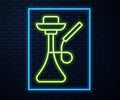 Glowing neon line Hookah icon isolated on brick wall background. Vector