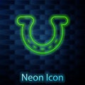 Glowing neon line Horseshoe icon isolated on brick wall background. Vector