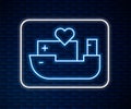 Glowing neon line Humanitarian ship icon isolated on brick wall background. Vector