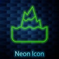 Glowing neon line Iceberg icon isolated on brick wall background. Vector