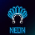 Glowing neon line Indian headdress with feathers icon isolated on black background. Native american traditional Royalty Free Stock Photo