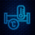 Glowing neon line Industry metallic pipe and temperature icon isolated on brick wall background. Plumbing pipeline parts