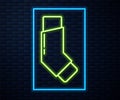 Glowing neon line Inhaler icon isolated on brick wall background. Breather for cough relief, inhalation, allergic