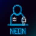 Glowing neon line Journalist news reporter with microphone icon isolated on black background. Colorful outline concept Royalty Free Stock Photo