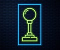 Glowing neon line Joystick for arcade machine icon isolated on brick wall background. Joystick gamepad. Vector