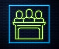 Glowing neon line Jurors icon isolated on brick wall background. Vector