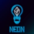 Glowing neon line Light bulb with leaf icon isolated on black background. Eco energy concept. Alternative energy concept Royalty Free Stock Photo