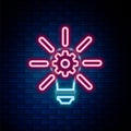 Glowing neon line Light bulb with rays shine and gear inside icon isolated on brick wall background. Innovation concept Royalty Free Stock Photo