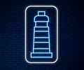 Glowing neon line Lighthouse icon isolated on brick wall background. Vector