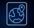 Glowing neon line Location on the globe icon isolated on brick wall background. World or Earth sign. Vector