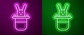 Glowing neon line Magician hat and rabbit icon isolated on purple and green background. Magic trick. Mystery