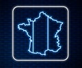 Glowing neon line Map of France icon isolated on brick wall background. Vector