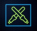 Glowing neon line Marshalling wands for the aircraft icon isolated on brick wall background. Marshaller communicated