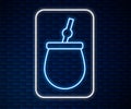 Glowing neon line Mate tea icon isolated on brick wall background. Vector