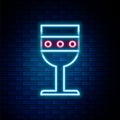 Glowing neon line Medieval goblet icon isolated on brick wall background. Colorful outline concept. Vector Royalty Free Stock Photo