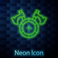 Glowing neon line Medieval shield with crossed axes icon isolated on brick wall background. Battle axe, executioner axe