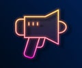 Glowing neon line Megaphone icon isolated on black background. Speaker sign. Vector