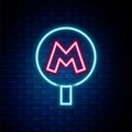 Glowing neon line Metro or Underground or Subway icon isolated on brick wall background. Colorful outline concept Royalty Free Stock Photo